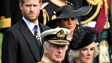 FILE PHOTO: Britain's Meghan, Duchess of Sussex, cries as she, Prince Harry, Duke of Sussex, Queen Camilla and King Charles attend the state funeral and burial of Britain's Queen Elizabeth, in London, Britain, September 19, 2022. REUTERS/Toby Melville/File Photo