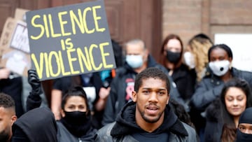 Boxer Anthony Joshua is seen with protestors during a Black Lives Matter protest in Watford.