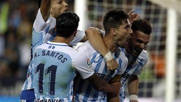 El Málaga respira en un partido bravo con nueve amarillas y dos rojas